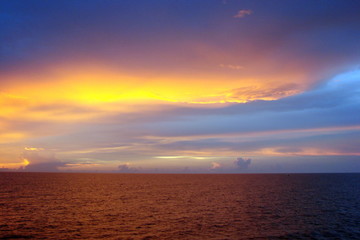 The landscape from the deck of the ocean liner is incredible beauty of the bright natural scenery of the sunset on the sea horizon.