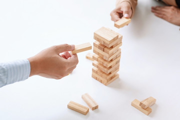 business people putting brick block together, Strategy and Solution concept.
