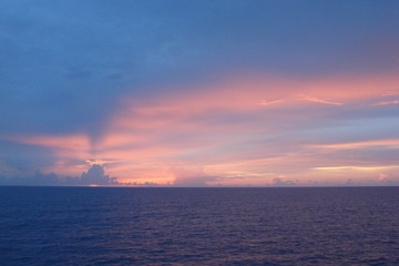 The landscape from the deck of the ocean liner is incredible beauty of the bright natural scenery of the sunset on the sea horizon.