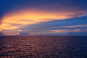 The landscape from the deck of the ocean liner is incredible beauty of the bright natural scenery of the sunset on the sea horizon.