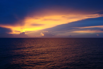 The landscape from the deck of the ocean liner is incredible beauty of the bright natural scenery of the sunset on the sea horizon.
