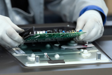 Assembly of printed circuit boards for TV sets at the factory