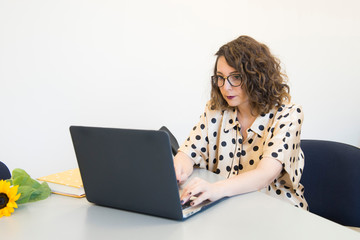 young worker with her laptop