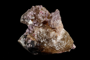 Tourmaline mineral stone close-up on a black background