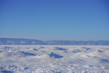 Fototapeta na wymiar Frozen lake in Baikal, Russia