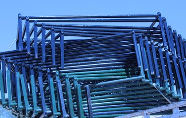 abstract view of wrought iron beds placed in the market shop