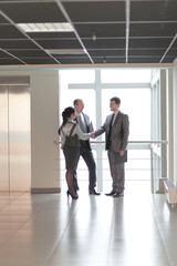 Manager welcomes the client in the lobby office