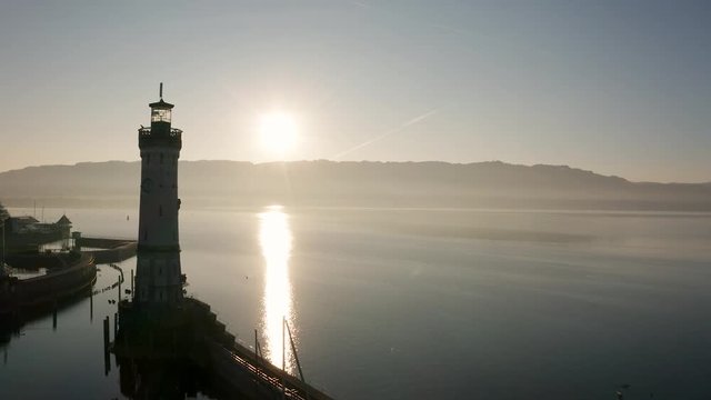 Cinematic flyby in Lindau Harbour – Lighthouse at sunrise