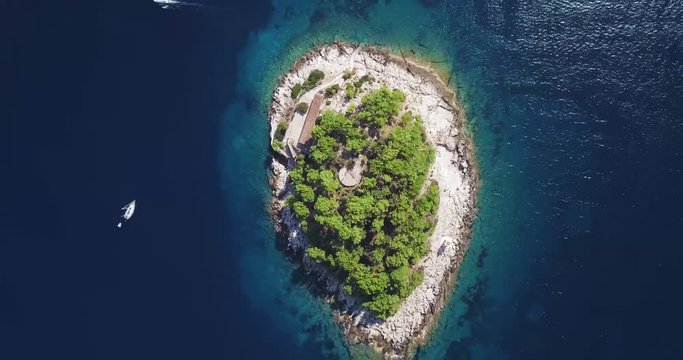 Top down view of beautiful island near Hvar, Croatia. Aerial rotating rise shot