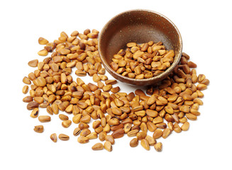 Pine nuts on white background 