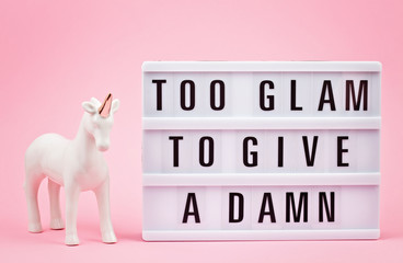 Lightbox with phrase Too glam to give a damn