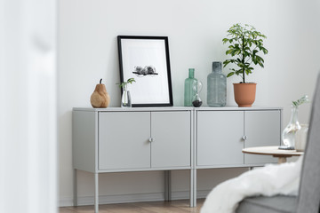 Home interior with gray sideboard