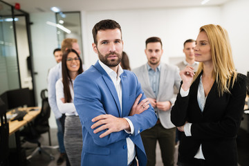 Portrait of business team posing in office