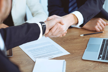 Business people shaking hands at meeting or negotiation in the office. Handshake concept. Partners are satisfied because signing contract