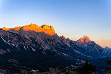 Fototapeta na wymiar Great evening scene of Dolomite Alps, Cortina d'Ampezzo, southern Alps in the Veneto region of Northern Italy, Europe. Scenic view of majestic mountains in autumn time.