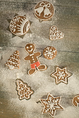 Christmas gingerbread made of flour on grey table. shortbread cookies for Christmas