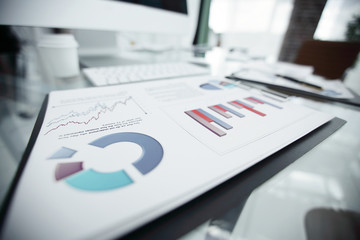 Fototapeta premium closeup.financial report on the table of the businessman