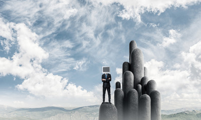 Businessman with monitor instead of head.