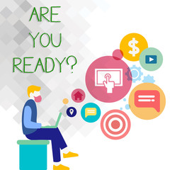Text sign showing Are You Readyquestion. Business photo showcasing Prepare well to face upcoming business changes Man Sitting Down with Laptop on his Lap and SEO Driver Icons on Blank Space