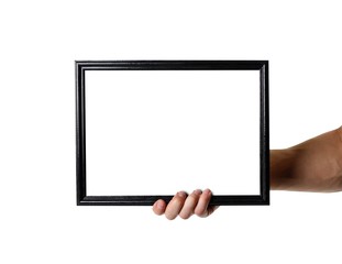 Hand holding black A4 frame. An empty frame with a white background. Close up. Isolated on white background