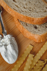 ingredients for pasta on wooden board