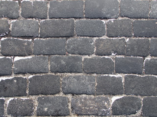 Obraz premium Abstract background from old pavement top down view