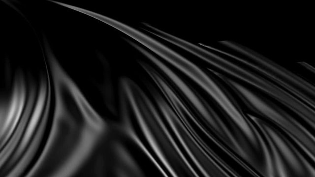 Black fabric in slow motion. The fabric develops smoothly in the wind. Wind waves spread through the fabric. This version of the fabric in smooth motion is suitable for almost any video