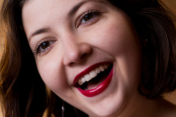 Portrait of young beautiful smiling woman