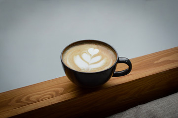 Coffee on the wooden floor