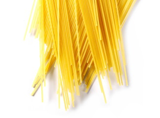 Spaghetti, yellow pasta isolated on white background, top view