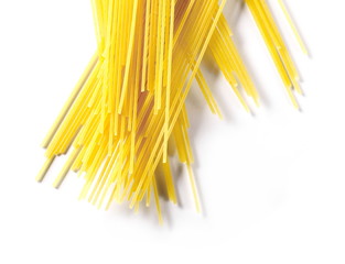 Spaghetti, yellow pasta isolated on white background, top view