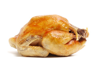 Whole roasted chicken against white background