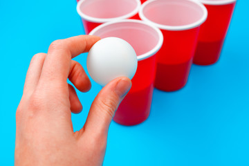 Cups for game Beer Pong on the table