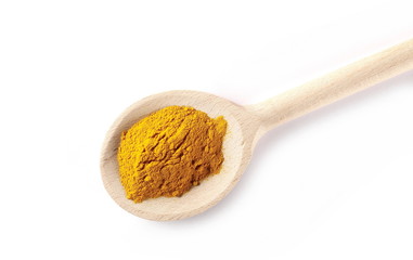 Turmeric (Curcuma) powder with wooden spoon isolated on white background, top view
