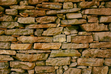 Fototapeta premium Old multicolored stone wall