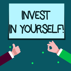 Word writing text Invest In Yourself. Business photo showcasing learn new things or materials thus making your lot better Two Businessmen Hands Gesturing the Thumbs Up and Okay Sign for Promotion