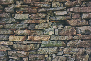 Old multicolored stone wall