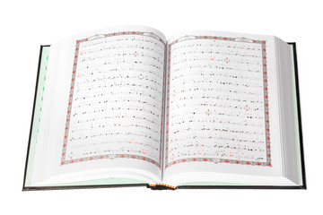 The Holy Quran over white background