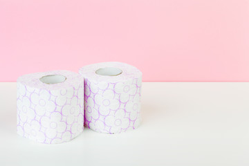 Roll of toilet paper or tissue  on color background