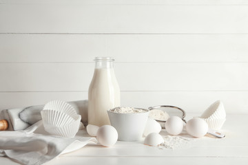 Fresh ingredients for bakery on white table