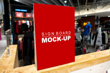 Mock up signboard in fashion clothes shop in shopping mall
