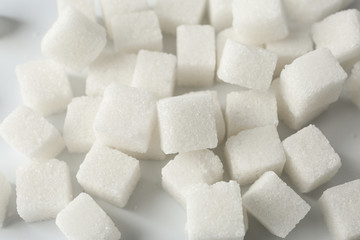 Sugar cubes on white background