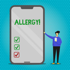 Text sign showing Allergy. Business photo text damages in immunity due to hypersensitivity get it diagnised Man Presenting Huge Blank Screen Smartphone while Holding Another Mobile