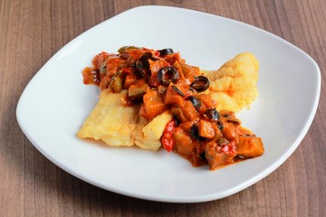 Merluza a la romana con verduras