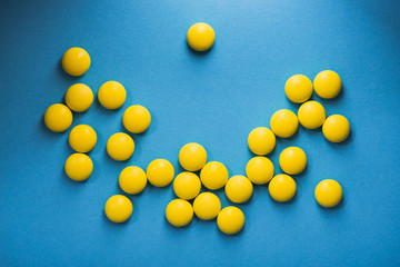 Medical yellow round pills