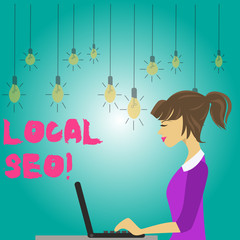Word writing text Local Seo. Business photo showcasing incredibly effective way to market your near business online photo of Young Busy Woman Sitting Side View and Working on her Laptop
