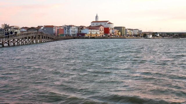 Lesina, Gargano National Park, Apulia, Italy - March 11 2019: the panorama of Lesina and (lake) lagoon at sunset