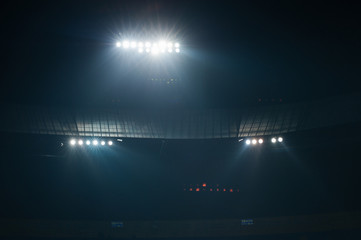 Stadium lights against dark night sky background. Soccer match lights. - 257653510