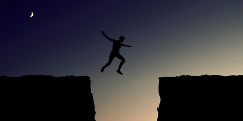 Mut und Überwindung Konzept mit großem Sprung © Robert Kneschke