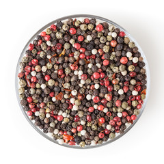 Mixed of diffrent kind peppercorns in glass bowl isolated on white background with clipping path